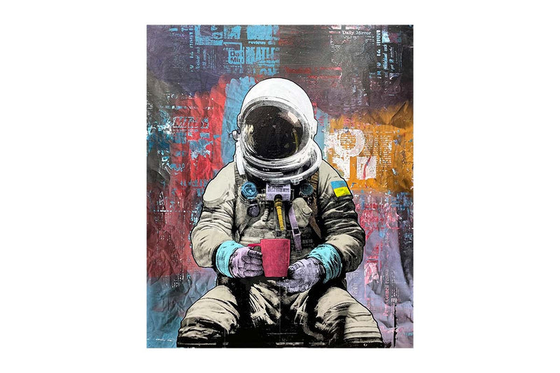 A canvas art print of a person in a spacesuit sitting down holding a pink mug