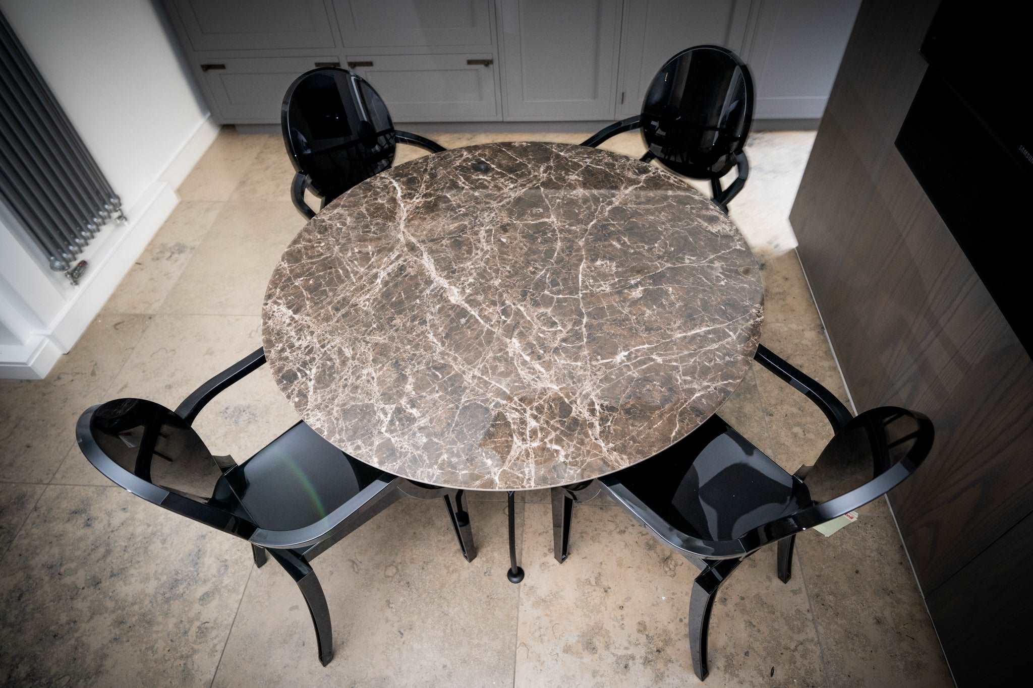 Kartell Glossy Marble Table with Louis Ghost Chairs