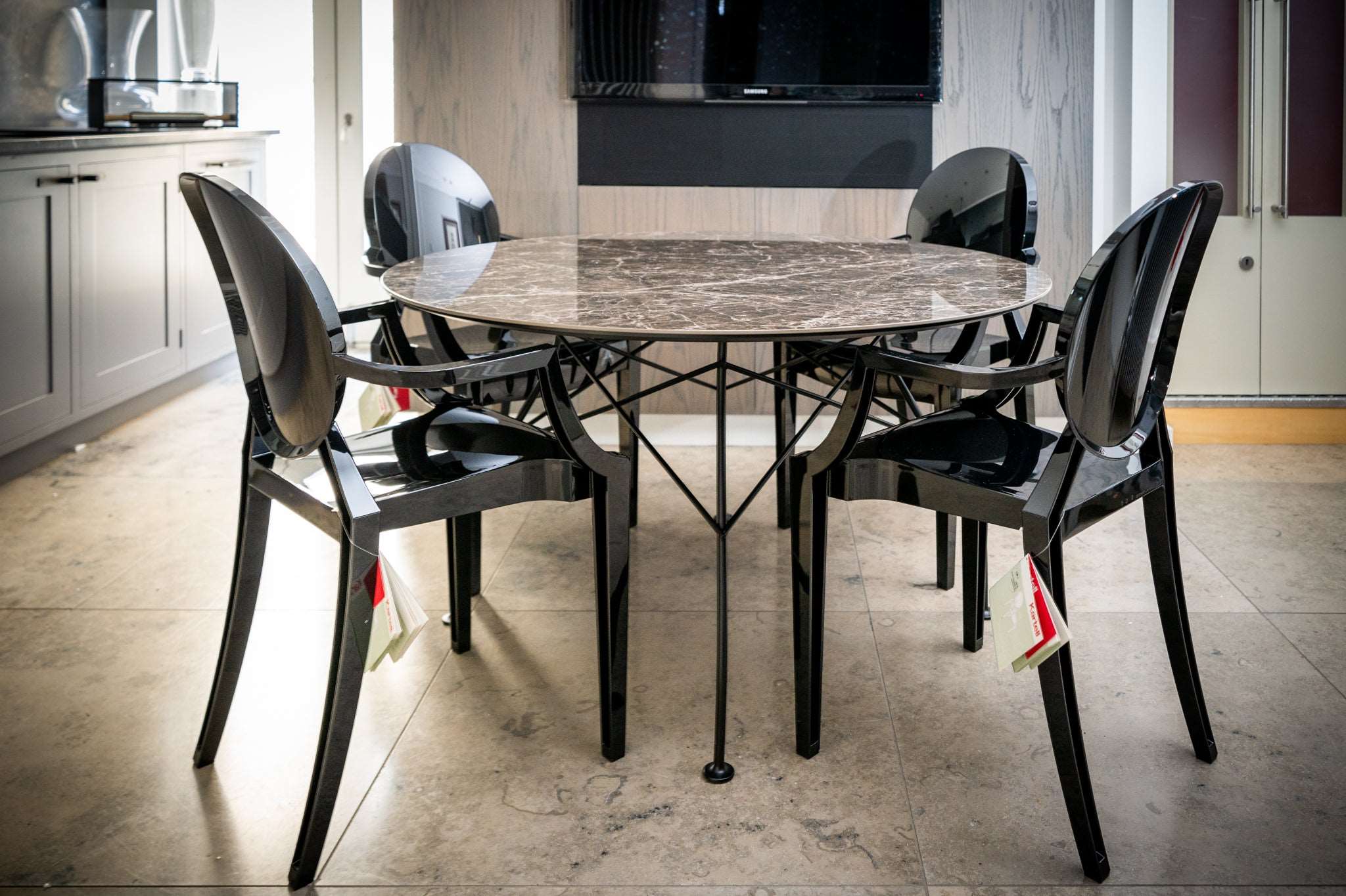 Kartell Glossy Marble Table with Louis Ghost Chairs